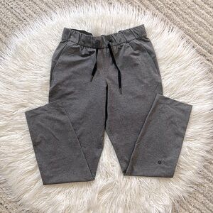 Grey lululemon on the fly 7/8 length pants, size 4
